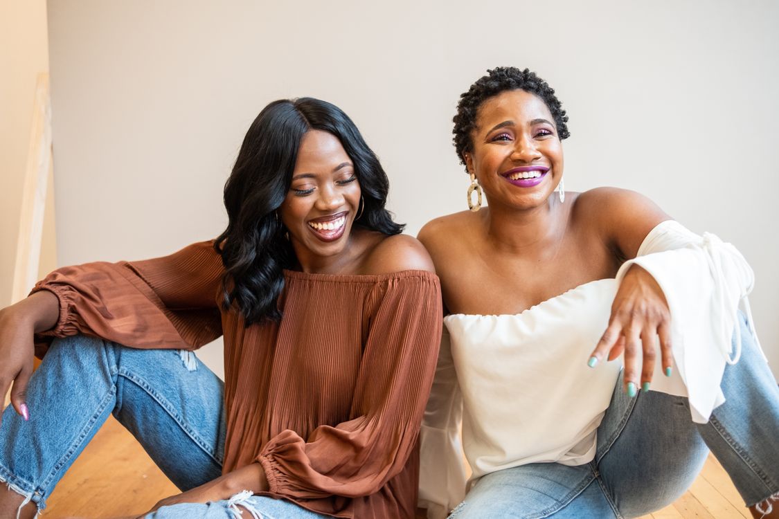 Two women sharing a warm moment of laughter